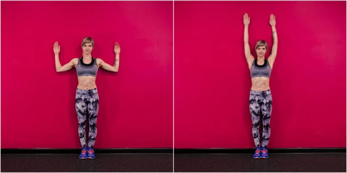 Hur man förstorar dina bröst med träning: lyft armarna bredvid en vägg